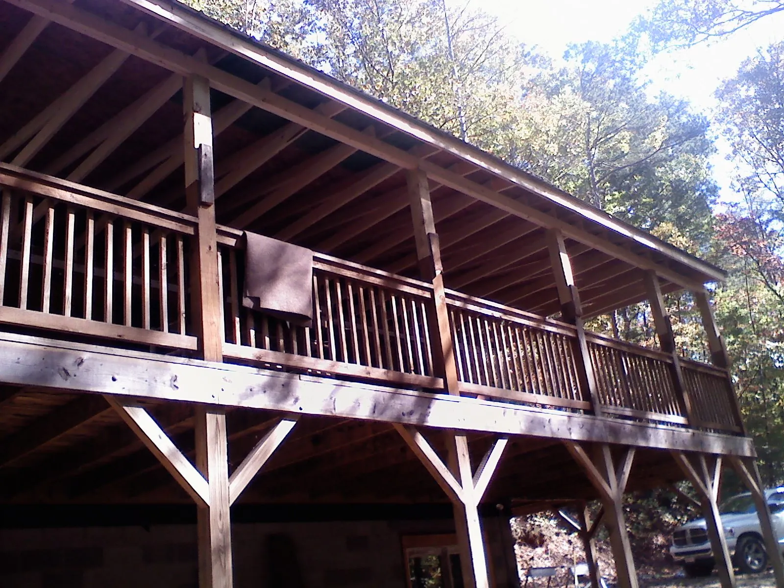Timber framing under a new elevated porch and deck — Roof Leak Repair in Mannsville by Roofing Brothers